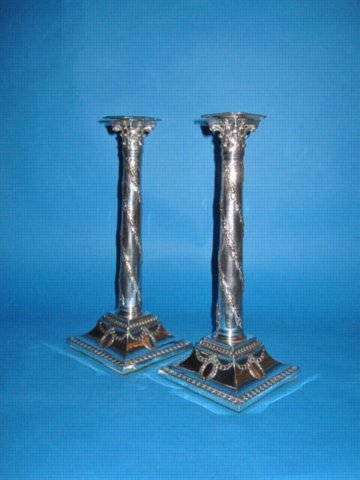 A Pair of George III Corinthian Column Candlesticks, possibly by John Winter & Co., circa 1775. - Click to enlarge and for full details.