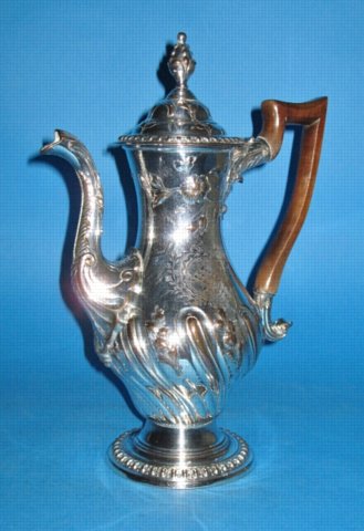 A GEORGE III COFFEE POT BY HOYLAND & CO., CIRCA 1765. - Click to enlarge and for full details.