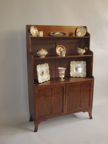 MAHOGANY & OAK WATERFALL BOOKCASE. CIRCA 1810 - Click to enlarge and for full details.