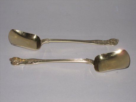 PAIR SILVERGILT ICE SPADES. - Click to enlarge and for full details.