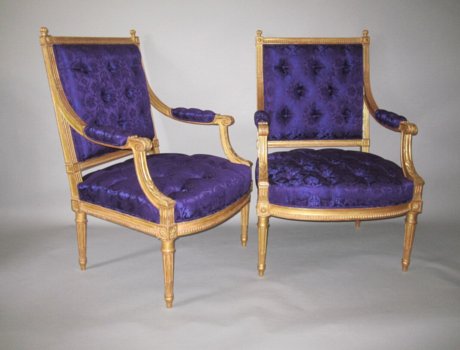 A PAIR OF EMPIRE PERIOD CARVED GILT WOOD ARM CHAIRS. FRENCH CIRCA 1825. - Click to enlarge and for full details.