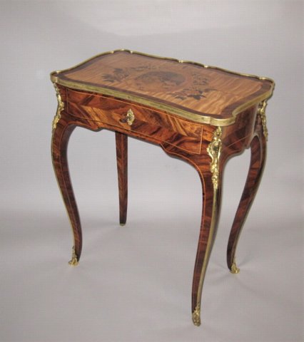 A ROSEWOOD AND MARQUETRY WRITING TABLE IN LOUIS XVI STYLE. - Click to enlarge and for full details.