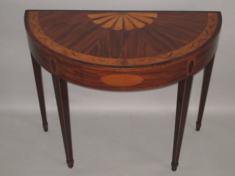 A FINE HEPPLEWHITE MAHOGANY DEMI-LUNE CARD TABLE. GEORGE III, CIRCA 1780. - Click to enlarge and for full details.