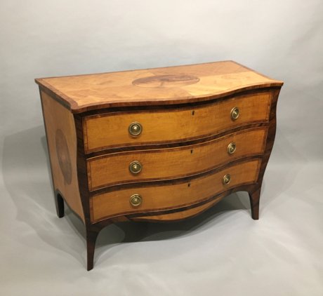 ​AN IMPORTANT 18TH CENTURY SATINWOOD SERPENTINE COMMODE. GEORGE III, CIRCA 1780.  - Click to enlarge and for full details.
