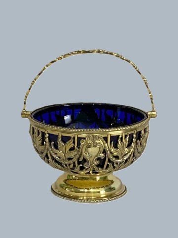 A GEORGE III IRISH SILVER GILT SWING HANDLED SUGAR BASKET, CIRCA 1790  - Click to enlarge and for full details.
