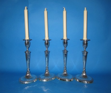 Set of four candlesticks, circa 1785. - Click to enlarge and for full details.