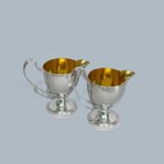 ​A PAIR OF GEORGE III OLD SHEFFIELD PLATE SILVER & GILT CREAM JUGS - Click to enlarge and for full details.